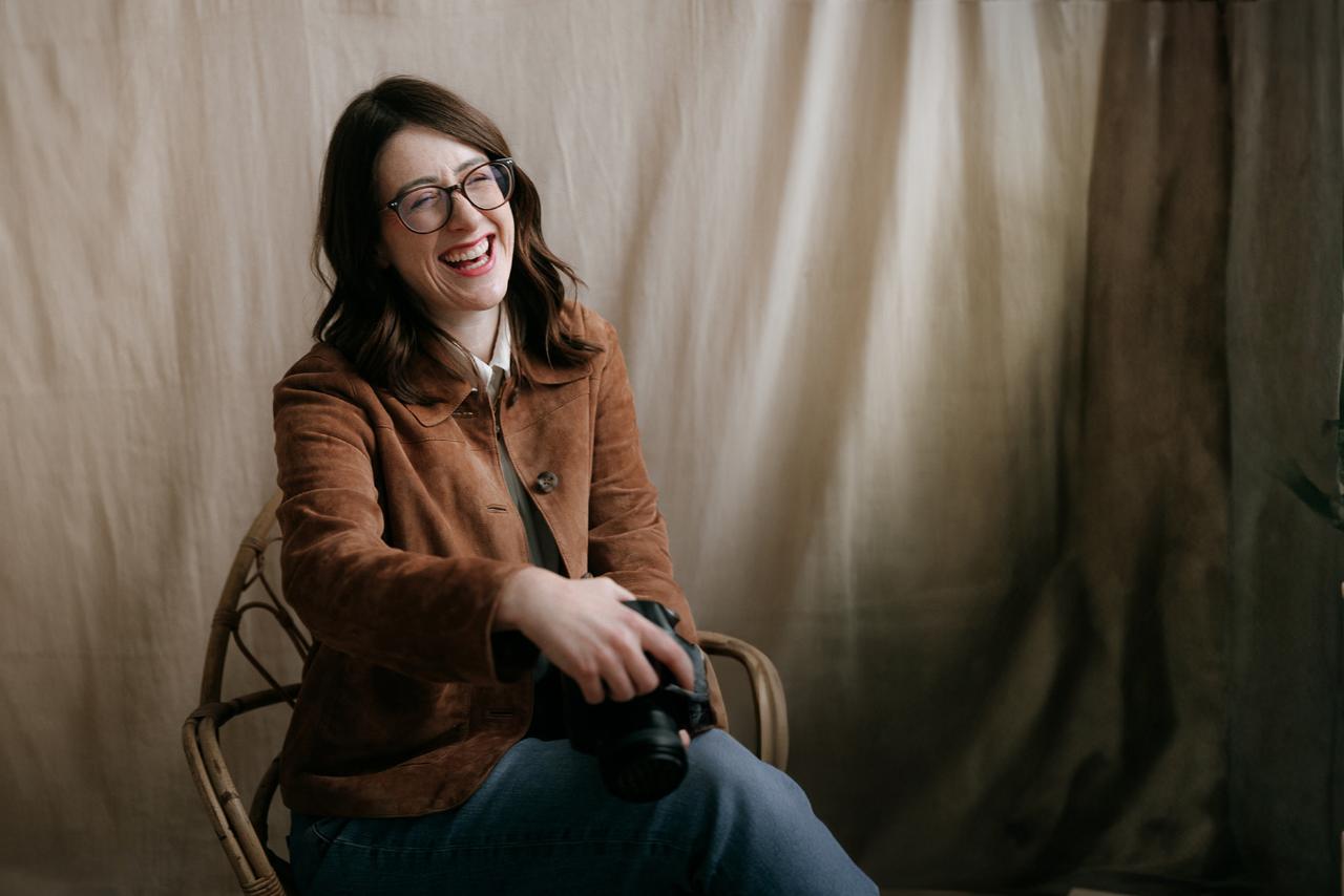 lady laughing with camera
